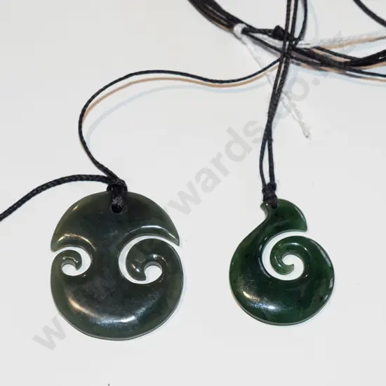 green-stone pendants on cord