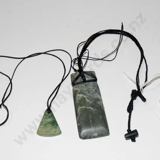 2x green-stone pendants on cord