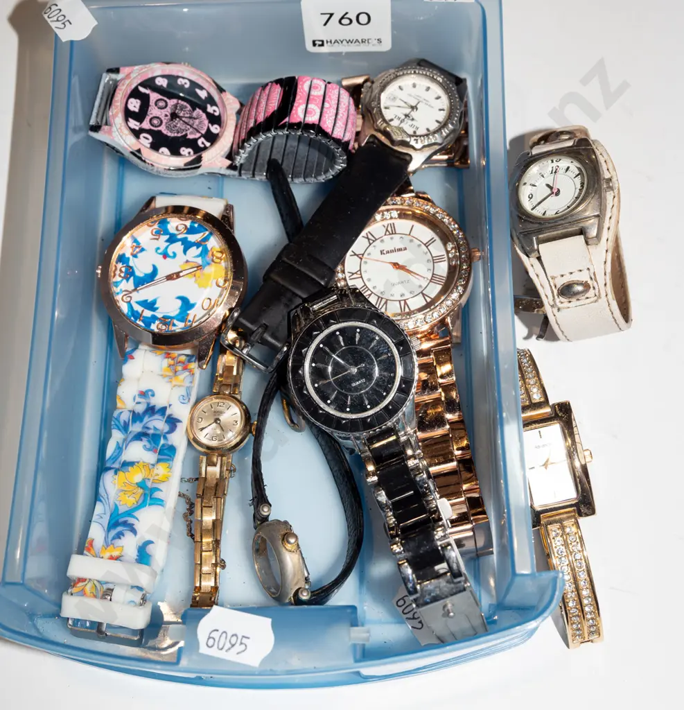 tray of wristwatches Image 1++