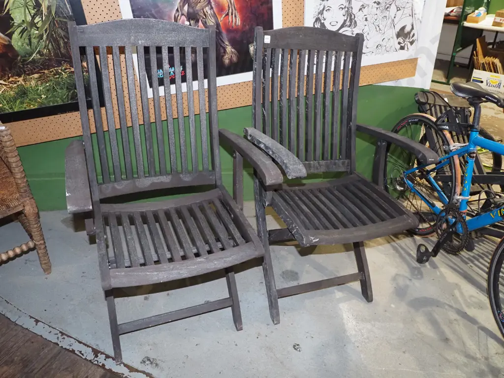 2x dark stained wooden foldaway outdoor chairs Image 1++