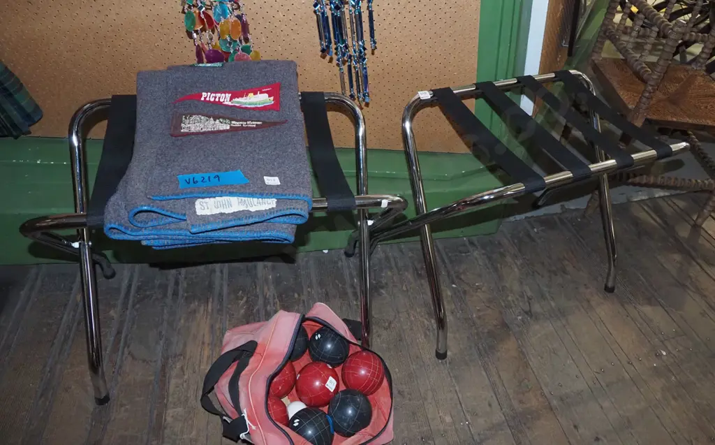 pair of chrome and black strapping luggage stands Image 1++