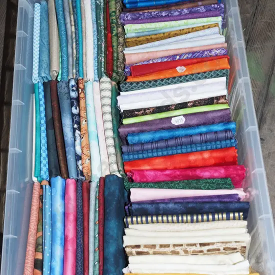 Sistema storage container, numerous fabric pieces