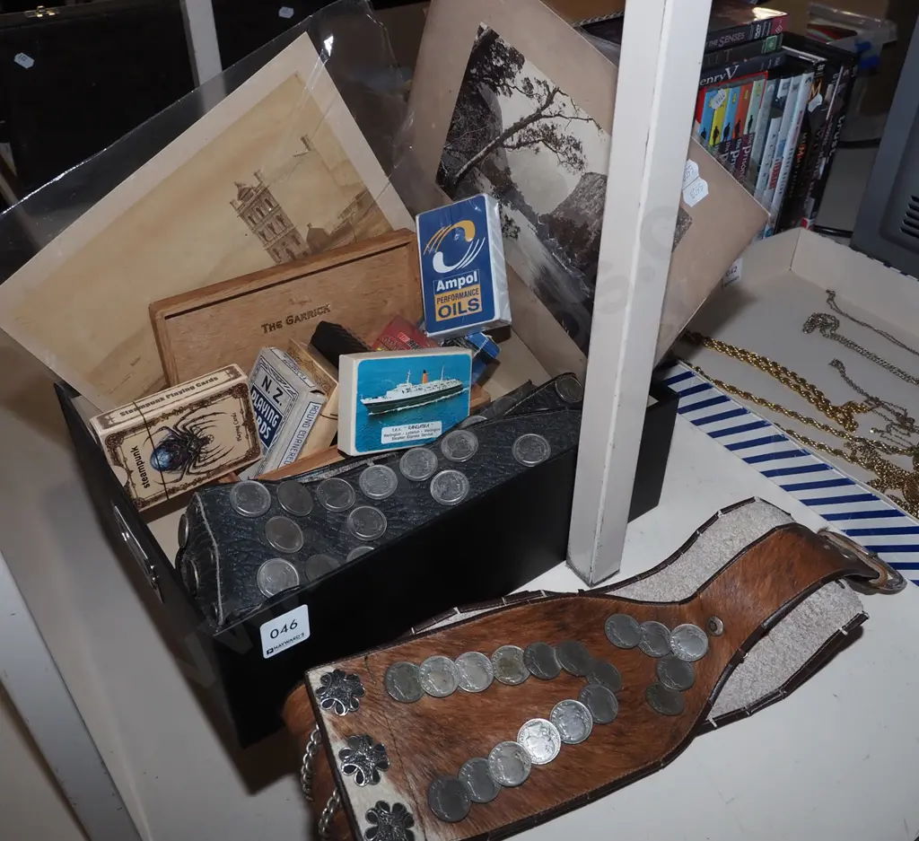 box; belt with coins, playing cards, black and white photographs Image 1++