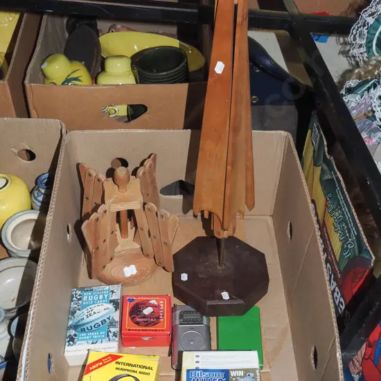 box; 2x small wooden airing racks, radio headphones, rugby quiz cards etc