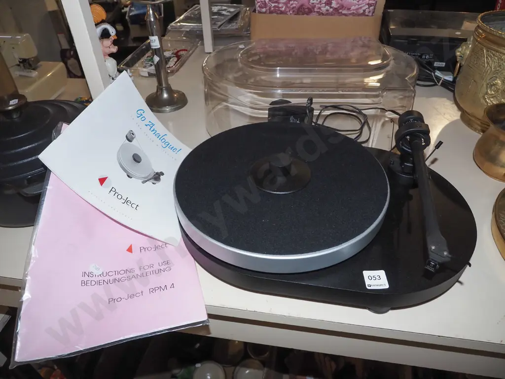 Pro-Ject turntable with dust cover, manuals and Phono Box preamplifier Image 1++