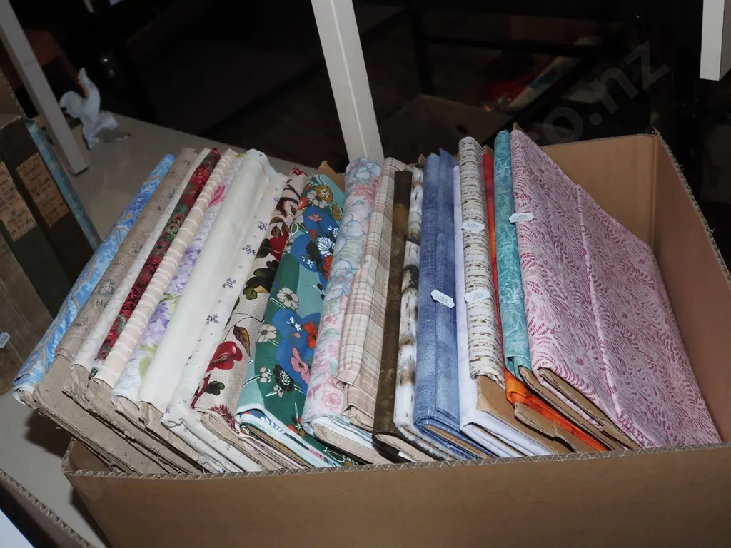 box of fabric pieces Image 1++