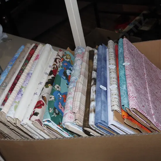 box of fabric pieces