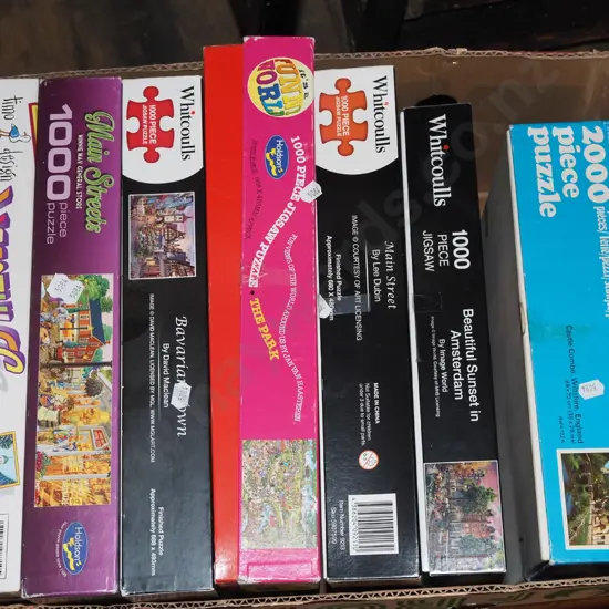 box of jigsaw puzzles