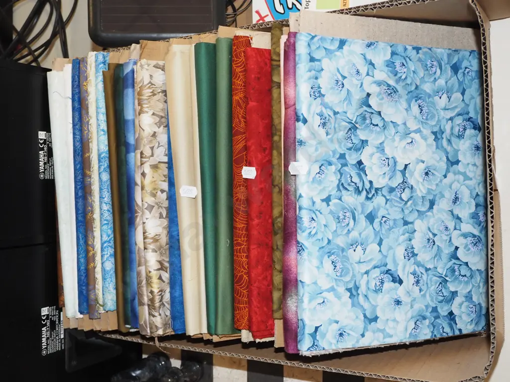 box of fabric pieces Image 1++