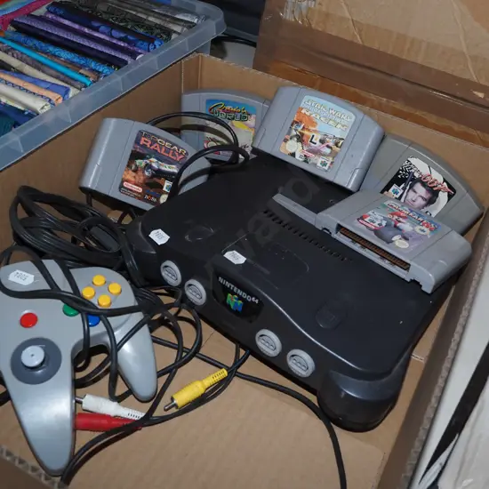 Nintendo 64 with controller and 5 games cartridges