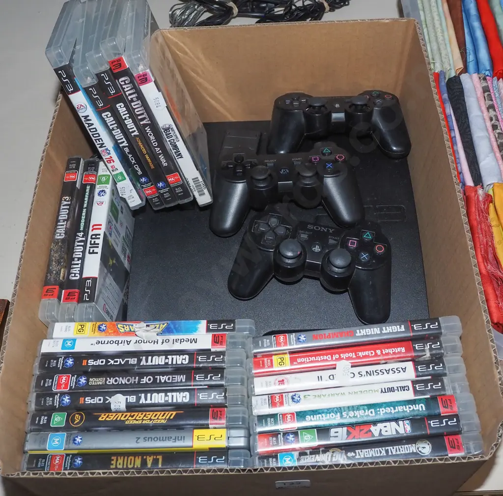 box; ps3 with controllers and various games Image 1++