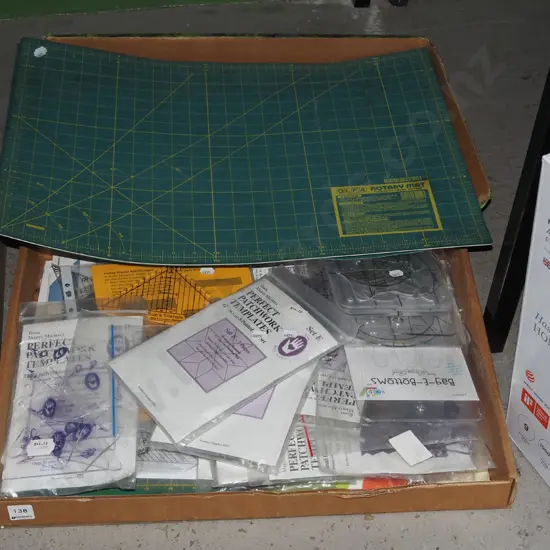 wooden box with numerous plastic patchwork templates, 2x cutting mats