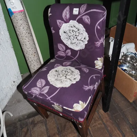 purple and floral upholstered child's chair