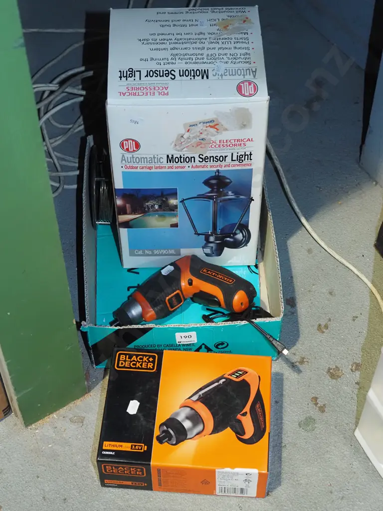 box; Black & Decker cordless screwdriver, motion sensor lights, coasters Image 1++