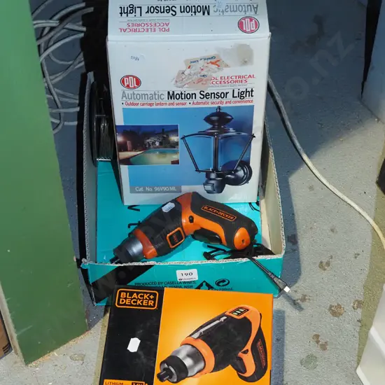 box; Black & Decker cordless screwdriver, motion sensor lights, coasters