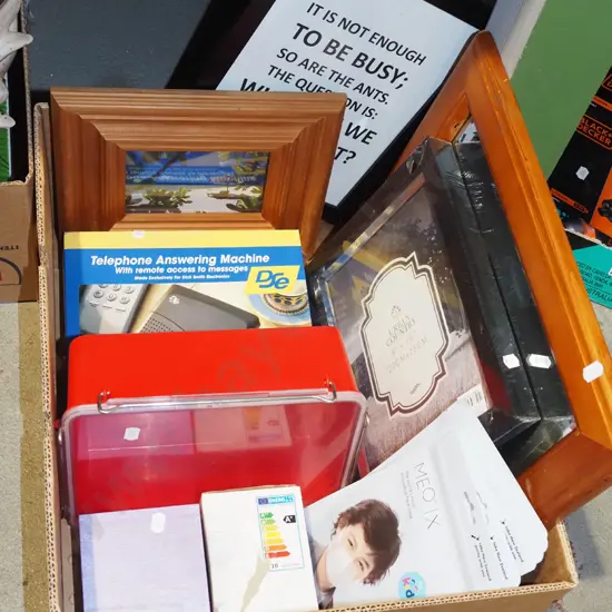 box; face masks, picture frames, telephone answer machine etc