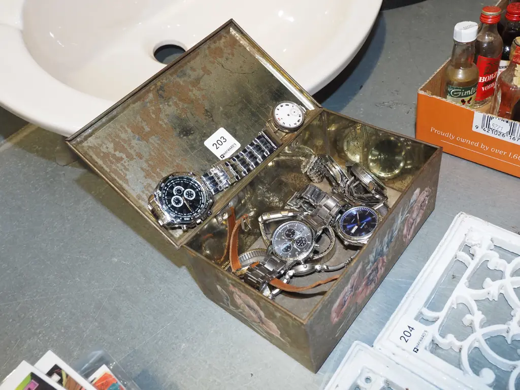 tin of wristwatches Image 1++
