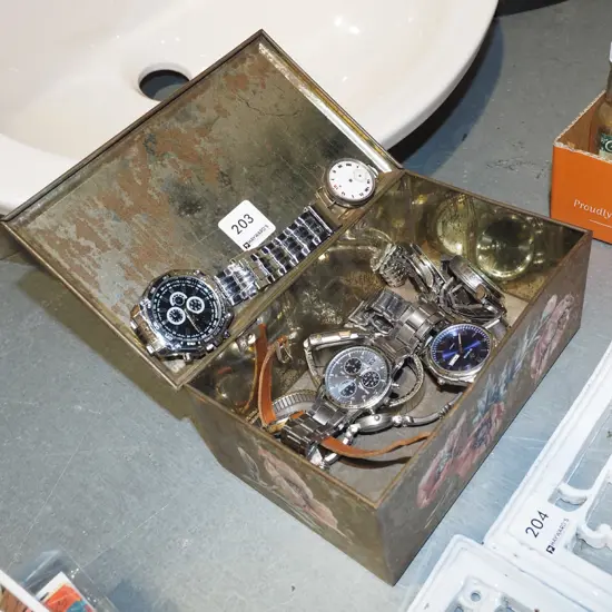tin of wristwatches