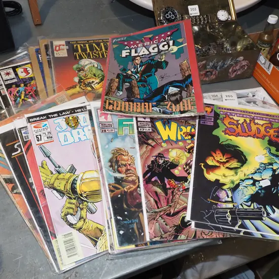 stack of various comics