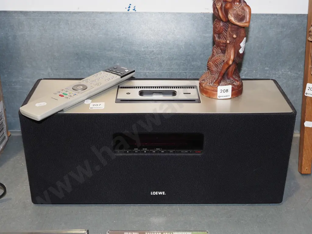 Loewe sound box, radio tuner, CD player, i-pod docking station- no battery cover to remote Image 1++