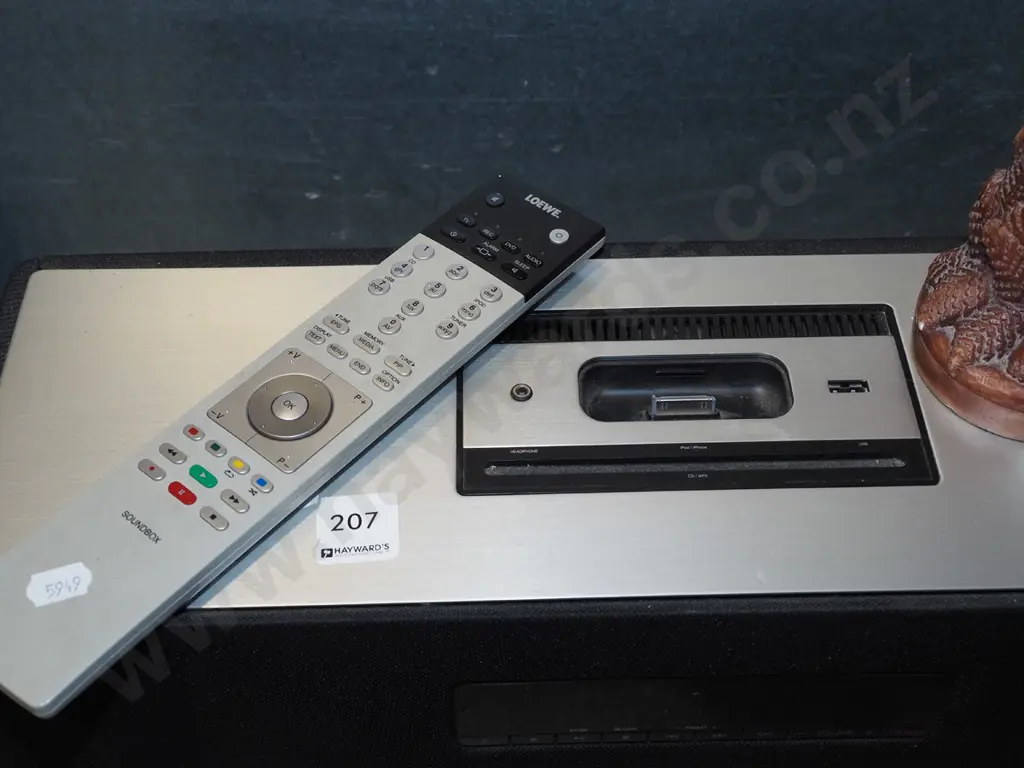 Loewe sound box, radio tuner, CD player, i-pod docking station- no battery cover to remote Image 1++