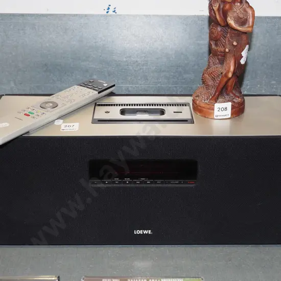 Loewe sound box, radio tuner, CD player, i-pod docking station- no battery cover to remote