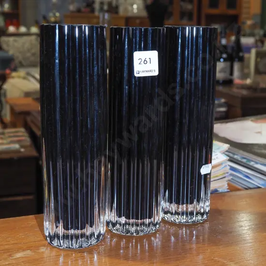 3x cylindrical dark glass vases H230