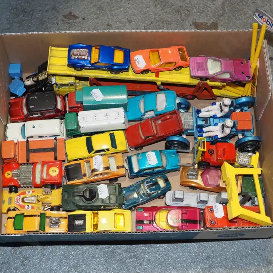 tray of model vehicles