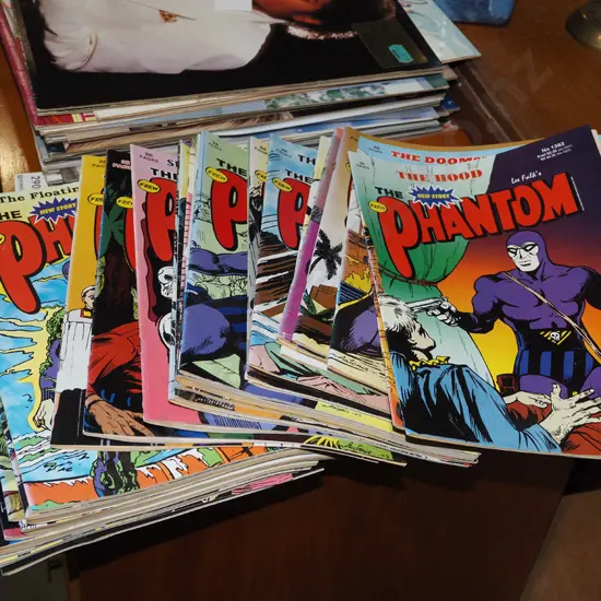 stack of Phantom comics