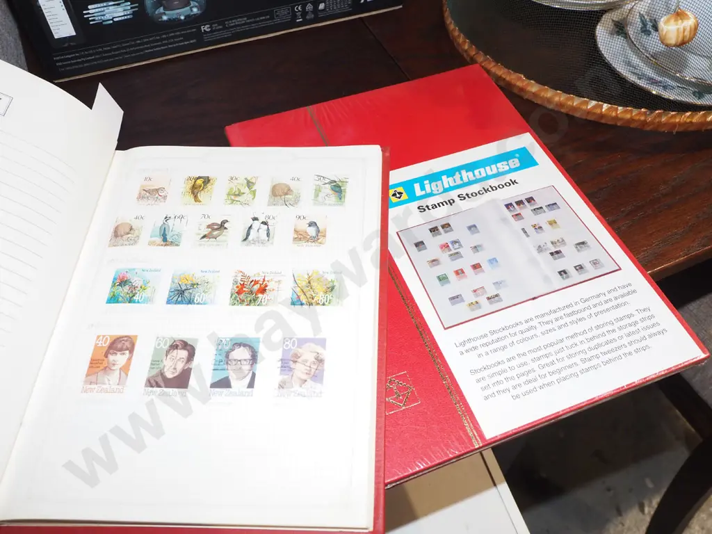 4x stamp albums Image 1++