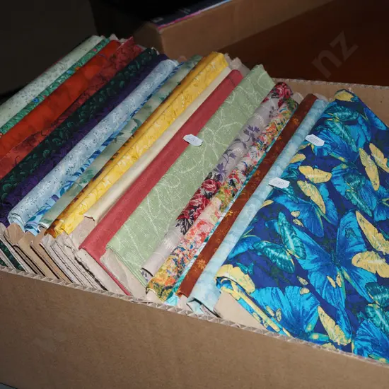 box of fabric pieces