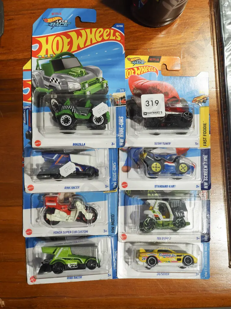 8x as new carded Hotwheels vehicles Image 1++