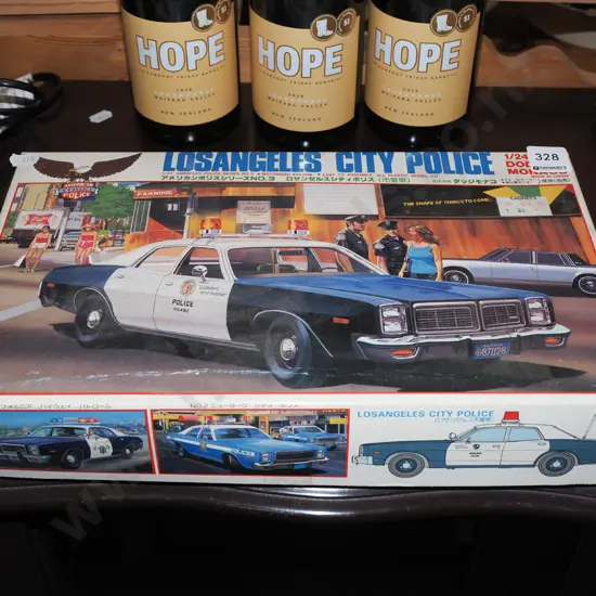 yet to be assembled plastic model kit - Los Angeles police car