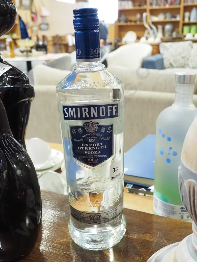 1L bottle of Smirnoff Export Strength vodka Image 1++