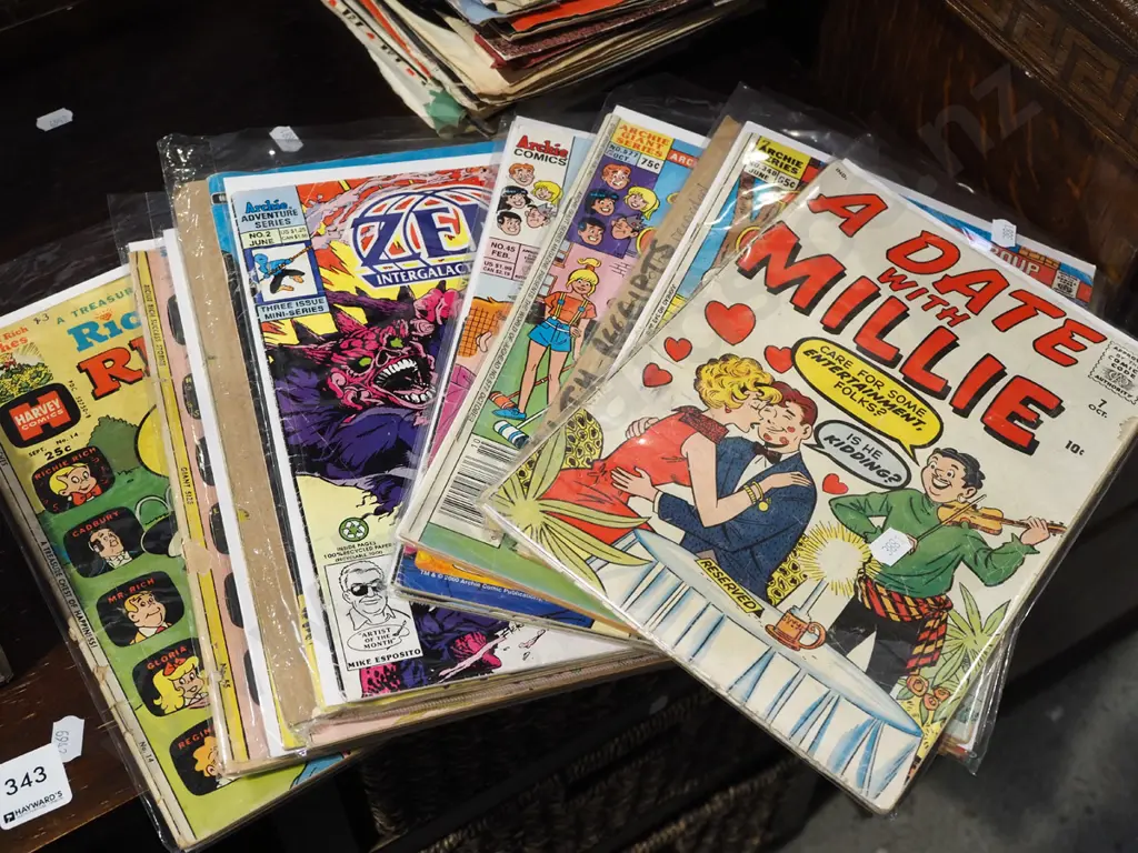 stack of comics Image 1++
