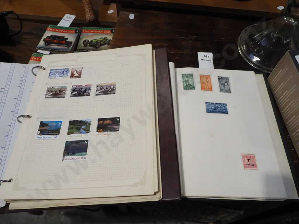 2x stamp albums Image 1++