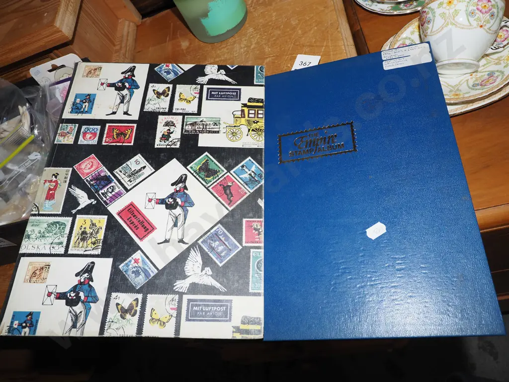 2x stamp albums Image 1++
