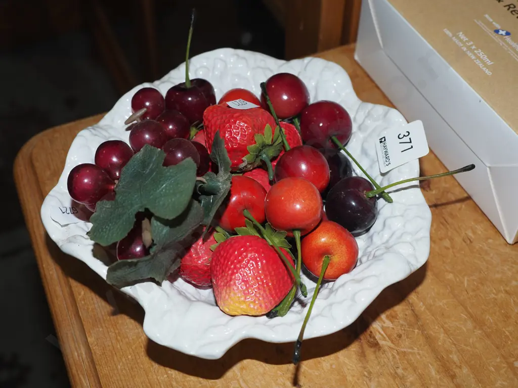 leaf shaped bowl with plastic cherries, grapes and strawberries Image 1++