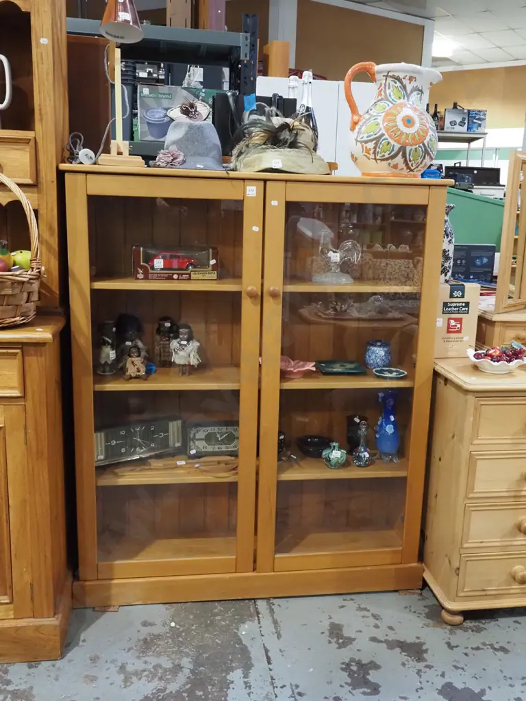 solid rimu display cabinet with 2 glazed doors and internal adjustable shelves H1310 W1000 D300 Image 1++
