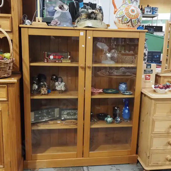 solid rimu display cabinet with 2 glazed doors and internal adjustable shelves H1310 W1000 D300