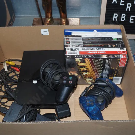 box; playstation 2, games and controllers