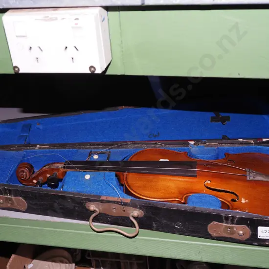 cased restorer's violin and bow