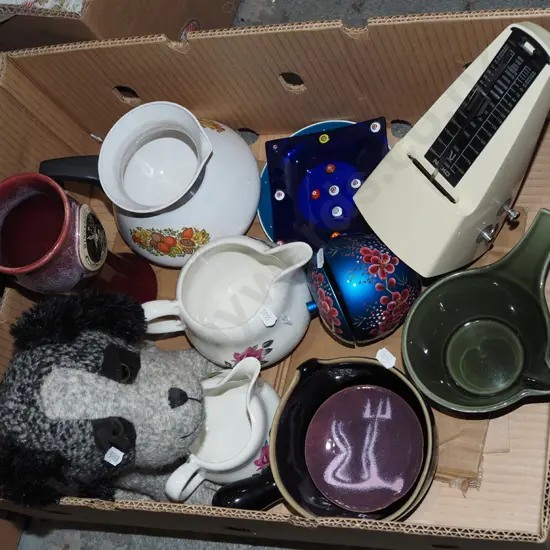 box; toy dog, jugs, metronome etc