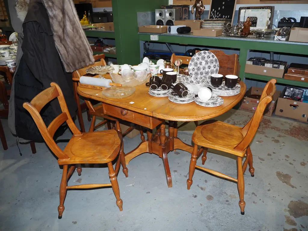solid pine pedestal dropside kitchen table with 1 internal drawer and 4 ladder back chairs Image 1++