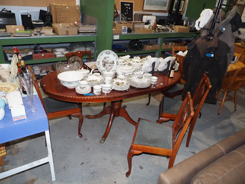mahogany veneer pedestal extending dining table with 4 upholstered splat back chairs Image 1++