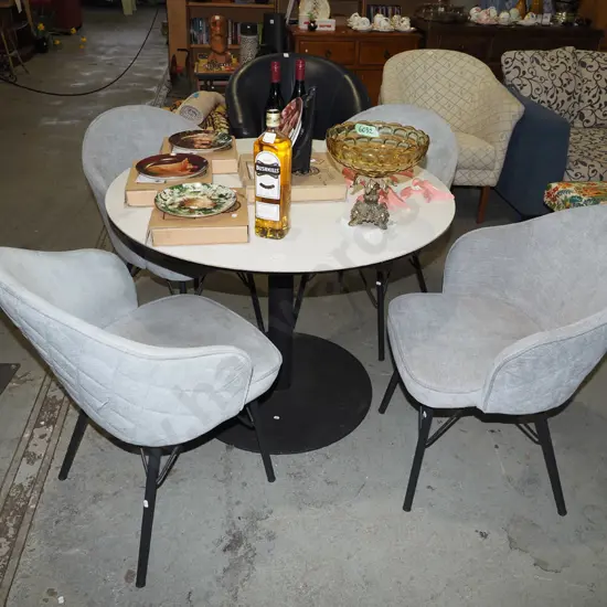 metal based white top dining table with 4 matching grey upholstered tub chairs Diam1000