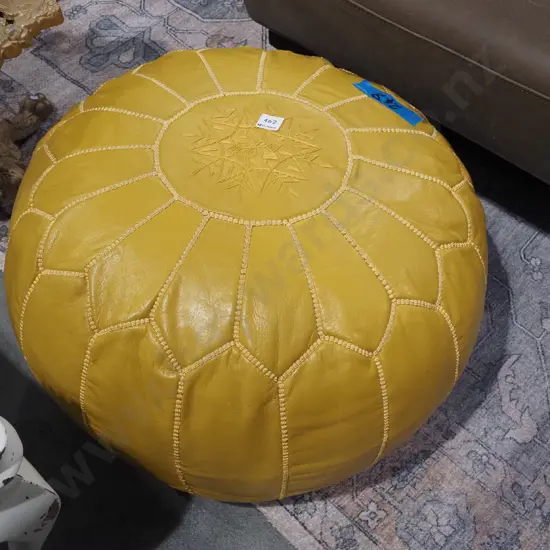 mustard coloured leather pouffe