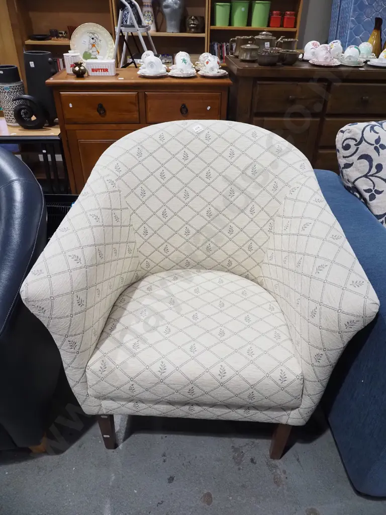 cream patterned upholstered tub chair Image 1++