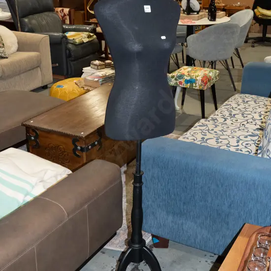 female mannequin torso on stand