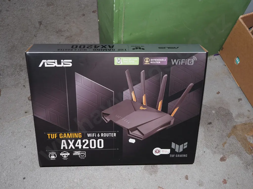 boxed Asus gaming wi-fi router Image 1++
